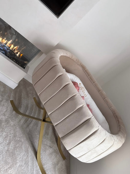 The OG navy baby fluted bassinet