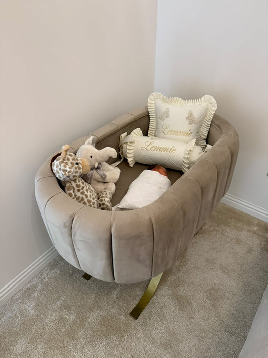 The OG navy baby fluted bassinet